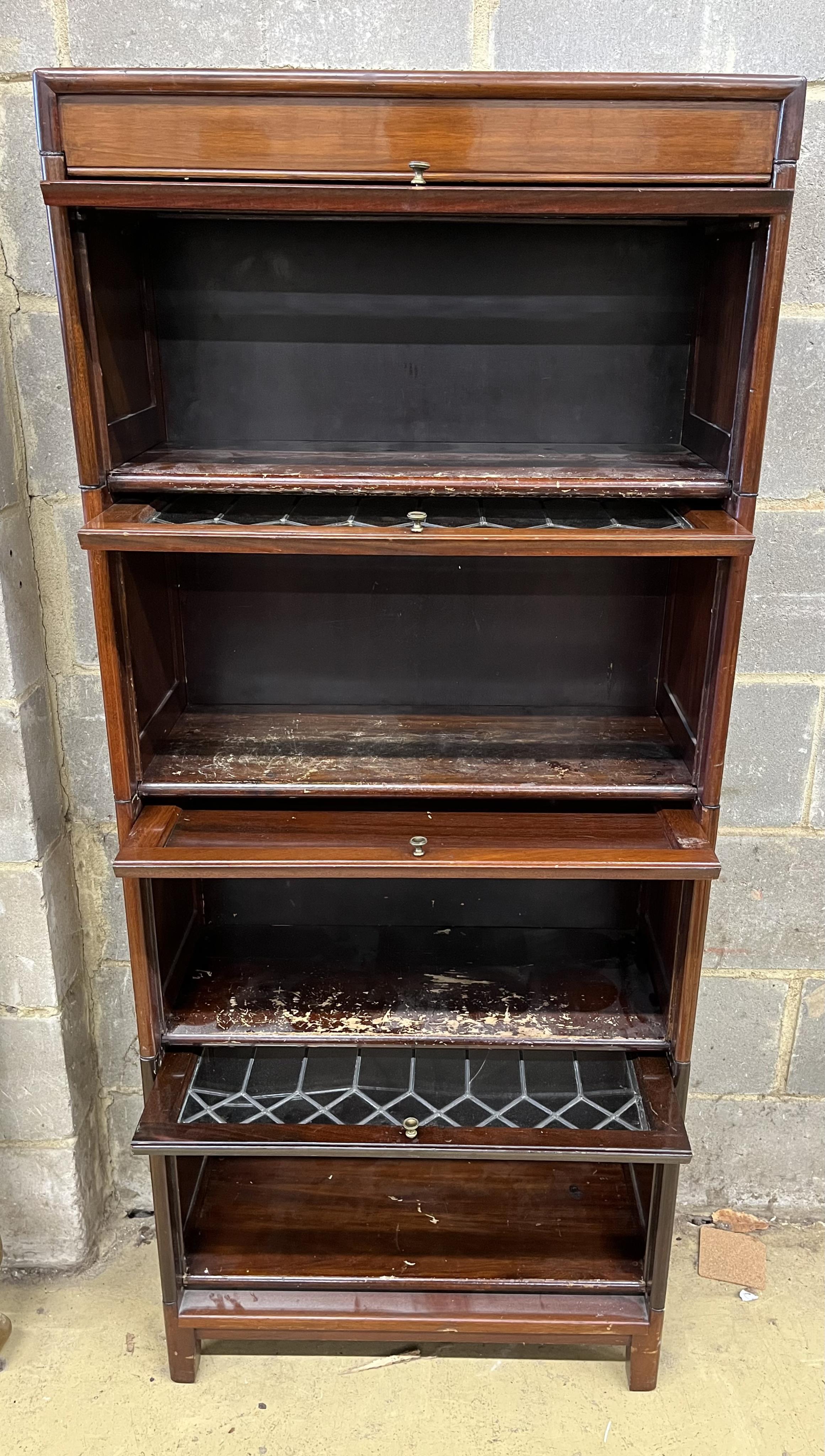 A narrow Globe Wernicke style mahogany four section bookcase, width 66cm, depth 31cm, height 156cm